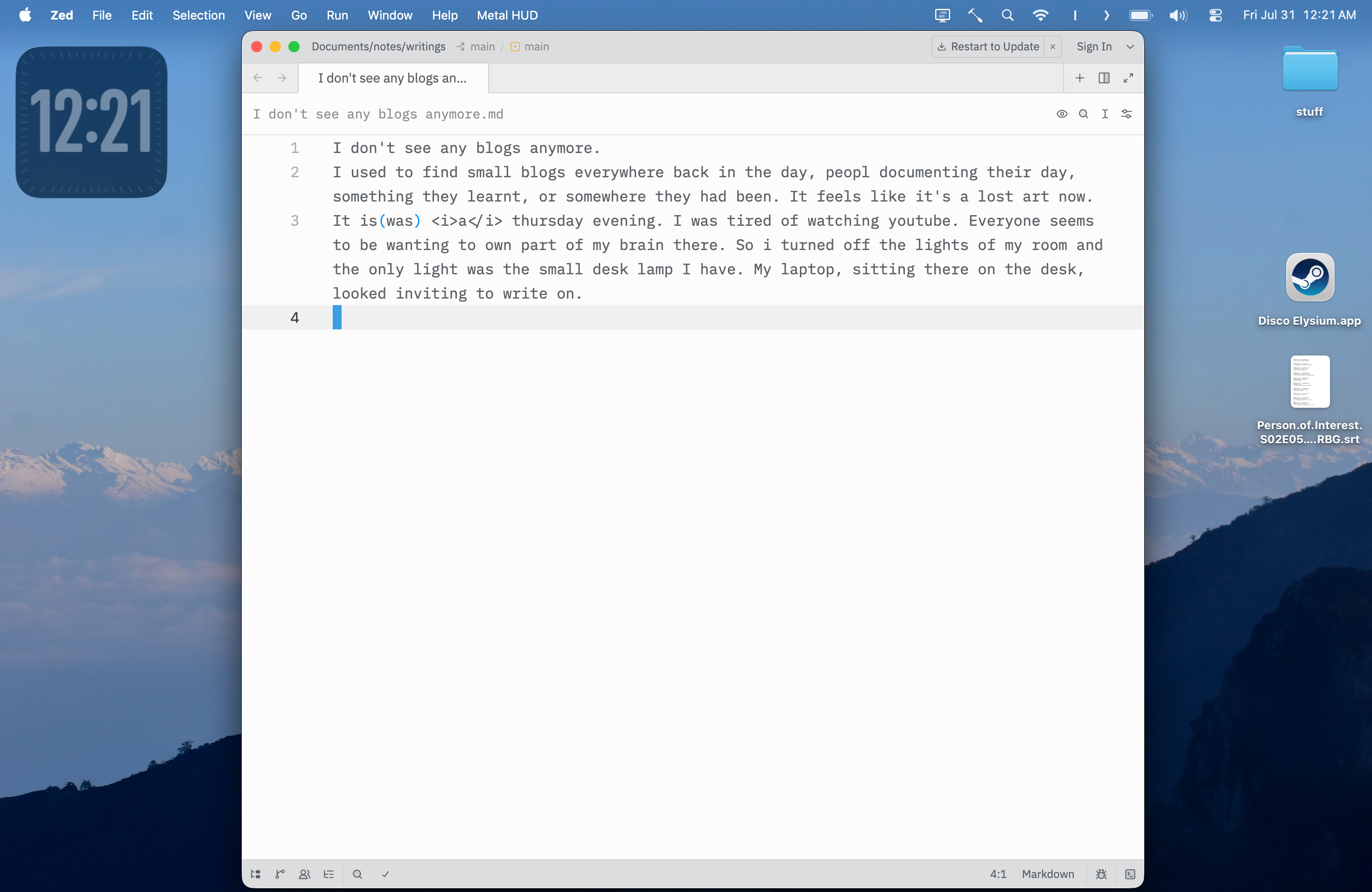 A simple MacBook desktop with a clock and text editor